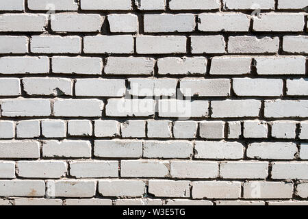 Bianco vecchio muro di mattoni texture dello sfondo. Questa sorta di mattoni è molto comune nel post paesi sovietici. Foto Stock