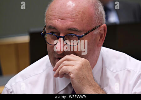 Bruxelles, Belgio, 15 luglio 2019. Phil Hogan, Commissario Ue assiste in un Unione europea Consiglio Agricoltura e pesca riunione. Credito: ALEXANDROS MICHAILIDIS/Alamy Live News Foto Stock