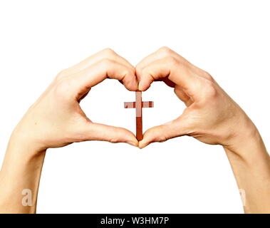 Donna che prega insieme a mano protesa con il crocifisso e il rosario croce immagine stock e stock photo Foto Stock