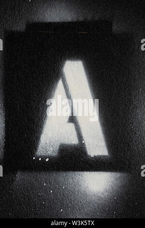 Lettera a spruzzo di grunge paninted font stencil Foto Stock
