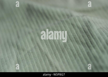 Indebolita di colore verde tessile texture di sfondo Foto Stock