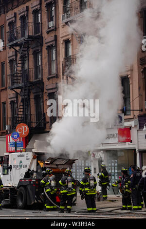 Spazzatrice sul fuoco a Park Slope Brooklyn NYC Foto Stock