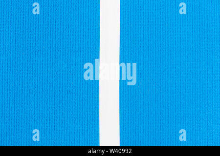 Blu acceso via gomma sintetica sull'athletic stadium. Foto Stock