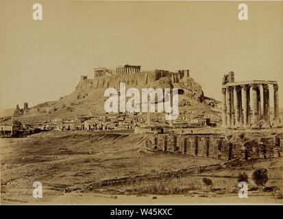 Constantinou Dimitrios - Il Tempio di Zeus Olimpio e l'Acropoli in background - Foto Stock