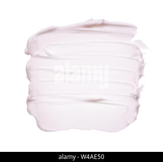 Delicatamente pennellate di colore rosa e la consistenza di crema per il viso o vernice acrilica isolati su sfondo bianco Foto Stock