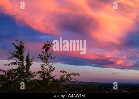 Estate tramonto su pozzi, Somerset, Regno Unito Foto Stock