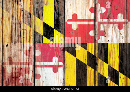 Maryland stato usa bandiera nazionale su un livello di grigio di tavole di legno sullo sfondo il giorno dell indipendenza in diversi colori di blu rosso e giallo. Un politico Foto Stock
