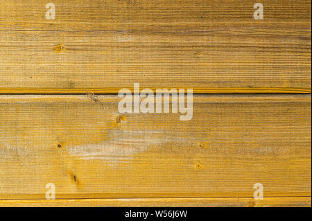 Vecchio muro di pannelli rivestiti con vernice. Sfondo. Foto Stock