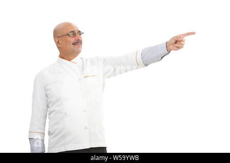 Lo chef mostra qualcosa Foto Stock