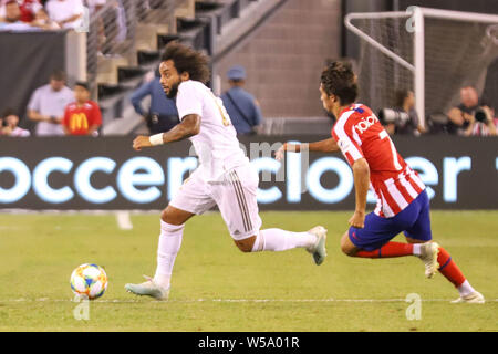 East Rutherford, Stati Uniti. 26 Luglio, 2019. Marcelo del Real Madrid e João Félix di Atletico Madrid partita valevole per l'International Champions Cup a MetLife Stadium di East Rutherford negli Stati Uniti il venerdì notte, 26th. Credito: Brasile Photo Press/Alamy Live News Foto Stock