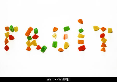 La parola frutta è stabilito con colorato canditi di frutta secca Foto Stock