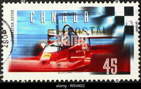 Celebrazione del pilota di Formula 1 Gilles Villeneuve sul francobollo Foto Stock