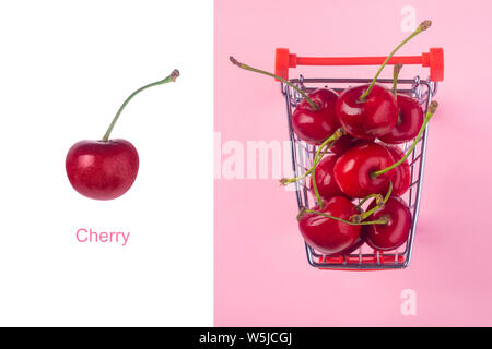 Layout creativo fatto di ciliegia di colore rosso, il minimalismo creativo Foto Stock