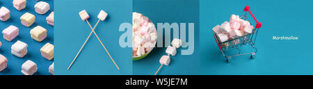 Layout creativo fatto di dolci marshmallows su sfondo blu. Il minimalismo concetto, immagine panoramica Foto Stock