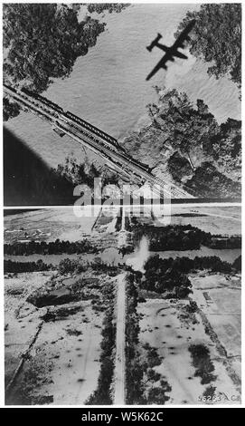 Campagna di bombardamenti. Sud-est asiatico e del Pacifico; Portata e contenuto: il 27 gennaio, 1945, B-24 liberatori del settimo gruppo di bomba, operando sotto il Mag. Gen. George E. Stratemeyer's Allied orientale comando aria, messo k.o. tre ponti sul Moulmein-Ye importante linea ferroviaria su cui il tentativo giapponese di portare una grande proporzione di forniture per le truppe sulla Birmania fronti. Qui è uno dei ponti, 35 miglia di sud di Moulmeni, prima dell'attacco. Come il B-24s lascia il bersaglio. Il ponte è completamente distrutta e il binario su entrambi gli approcci si trova ritorto e rotto. Foto Stock