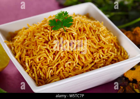 Bowl of Aloo Bhujia namkeen Stock Photo