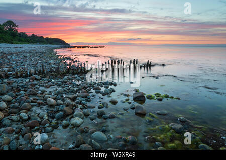 Tramonto sulla spiaggia Munkerup, Munkerup, Regione Hovedstaden, Zelanda, Danimarca, Europa Foto Stock