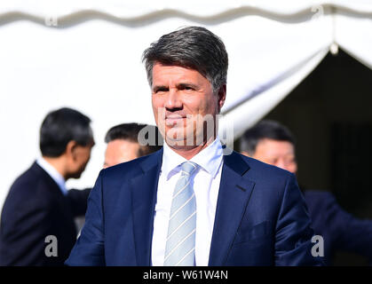 Harald Kruger, CEO e presidente del consiglio di amministrazione di BMW AG, partecipa alla cerimonia di apertura per la BMW di brillanza Tiexi nuovo impianto nella città di Shenyang Foto Stock