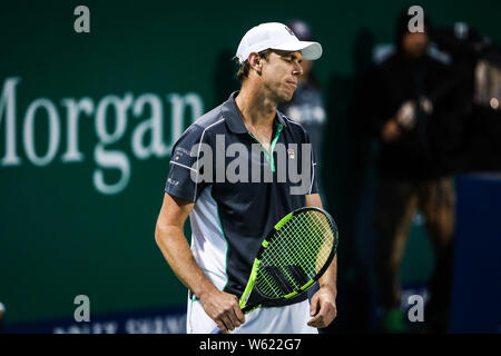 Sam QUERREY degli Stati Uniti reagisce come egli compete contro Kei Nishikori del Giappone nel loro terzo round match di uomini singoli durante il Rolex Foto Stock