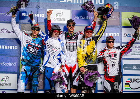 5 Giugno 2011 - Fort William, Scozia. UCI MTB World Cup DH podio 1. Greg Minnaar (RSA), 2. Danny Hart (GBR), 3. Brook MacDonald (NZ), 4. Gee Atherto Foto Stock