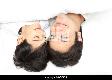 Father with son sleeping in the bed Stock Photo