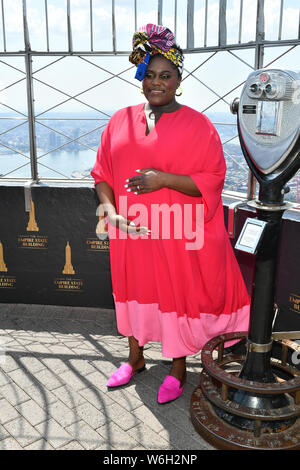 'L'arancione è il nuovo nero' TV show cast all'Empire State Building, New York, Stati Uniti d'America - 26 lug 2019 - Danielle Brooks Foto Stock