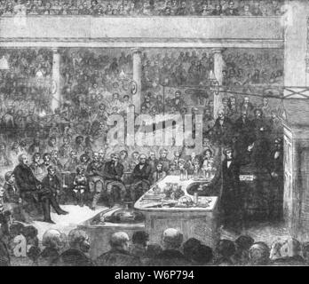 "Professore docente di Faraday presso il Regio Istituto prima che il Principe Consorte e il Principe di Galles, 1856", (1901). Michael Faraday (1791-1867) dando una lezione a cui hanno partecipato il Principe Alberto e suo figlio, il Principe Albert Edward (futuro re Edoardo VII). Gabbia di Faraday è stato uno dei più grandi scienziati del XIX secolo. Il suo contributo più significativo è stato "ricerche sperimentali su elettricità" che è stato pubblicato più di quarant'anni, in cui ha descritto le sue scoperte, comprese le leggi di induzione elettromagnetica (1831) e le leggi di elettrolisi (1833). Egli ha anche scoperto i principi o Foto Stock