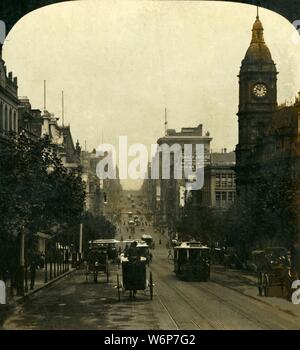 "Le città del sud assolato, Melbourne, Victoria, Australia", 1909. "Collins Street da Russell Street guardando ad ovest, un grand avenue'. A cavalli e veicoli tram su uno di Melbourne's principali arterie, con il Municipio e il Prince Alfred la torre sulla destra. Uno di un insieme di visualizzazioni stereocard da George Rose, in box come "studi attraverso lo stereoscopio", per essere visualizzato su un Sun stereoscopio scultura realizzata da Underwood &AMP; Underwood. [Rose Stereografia Company, Melbourne, Sydney, Wellington &AMP; Londra, c1909] Foto Stock