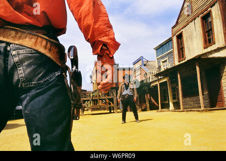 Cowboy, i cowboy prendono in giro le sparatorie a Texas Hollywood/Fort Bravo, Almeria, Spagna Foto Stock