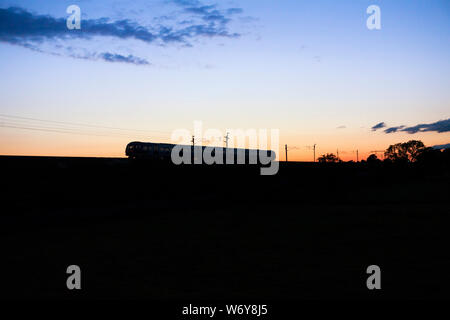 Nuovo Arriva Nord classe rampa 195 treno sulla west coast mainline con un autista di formazione gestita Foto Stock