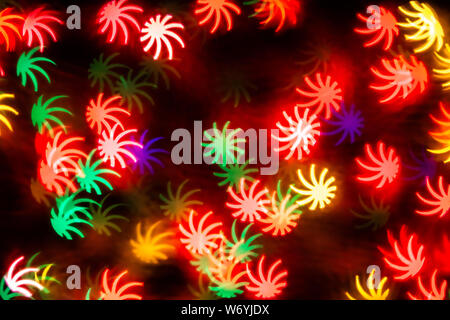 Forma di foglia multicolore bokeh di sfocatura dello sfondo astratto. Foto Stock