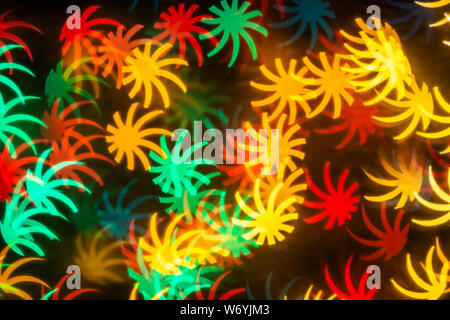 Forma di foglia multicolore bokeh di sfocatura dello sfondo astratto. Foto Stock