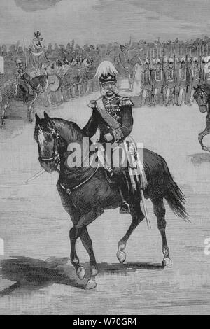 El Kaiser de Alemania. Guillermo I de Alemania (1797-1888). La gran revista militar en Nieder-Eschbach (Homburgo, Alemania). Desfie de las tropas del 11º cuerpo del'(Ejército alemán, al mando de S. M. I. Guillemo I, en presencia del Rey de España, Alfonso XII, y de los príncipes extranjeros, en la mañana del 21 de septiembre de 1883. Dibujo del natural por Juan Comba. Grabado por Rico. La Ilustración Española y Americana, 22 de octubre de 1883. Foto Stock