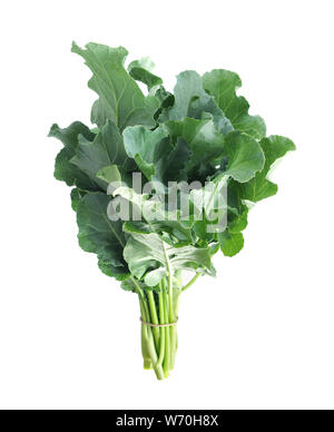 Giovani organico Brassicaceae (gai lan) isolato su bianco Foto Stock