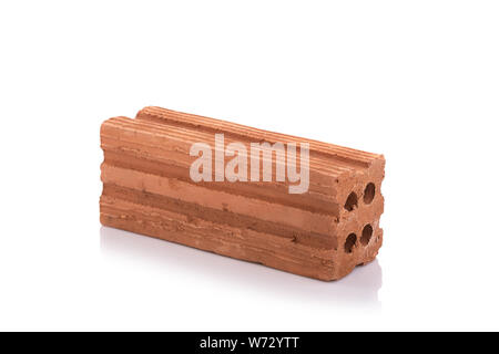 Nuovo cotto rosso mattone per costruire il muro isolato su sfondo bianco Foto Stock