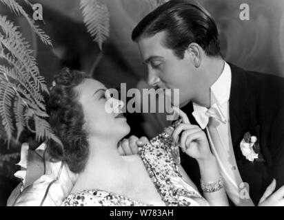 MARGARET LINDSAY, John Payne, giardino della luna, 1938 Foto Stock