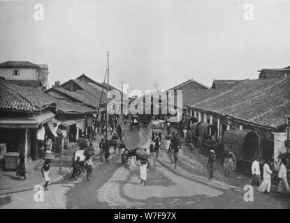 "Strada tipica scena in quarti nativo, Colombo', c1890, (1910). Artista: Alfred William Amandus piastra. Foto Stock