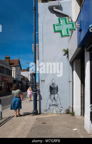 "Mi vedono Rollin' da Catman, graffiti della regina su un segway con tre Corgis su un muro esterno stivali in whitstable kent, Regno Unito Foto Stock