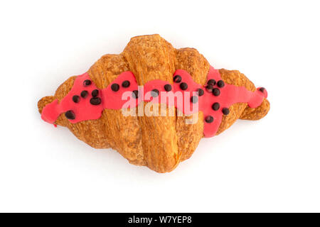 Deliziosa ricoperta di cioccolato croissant con le briciole Foto Stock