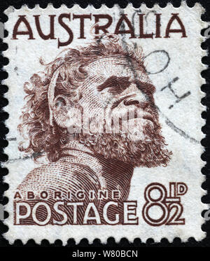 Testa di aborigeno australiano sul timbro Foto Stock