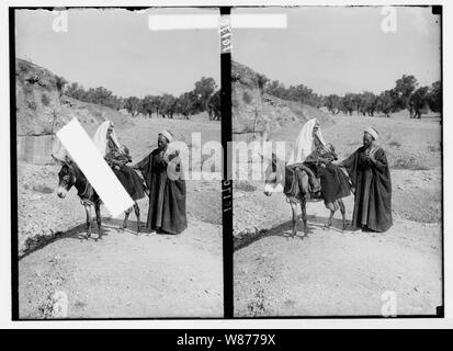 Fuga in Egitto. Tipi di contadini. Donna e bambino su Donkey. Uomo in piedi Foto Stock