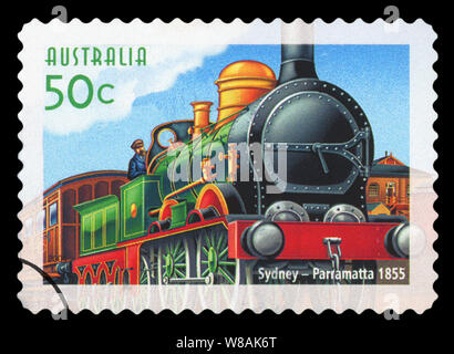 AUSTRALIA - circa 2004: utilizzate un francobollo da Australia, raffigurante una illustrazione di un inizio di motore a vapore treni passeggeri che correva tra Melbo Foto Stock