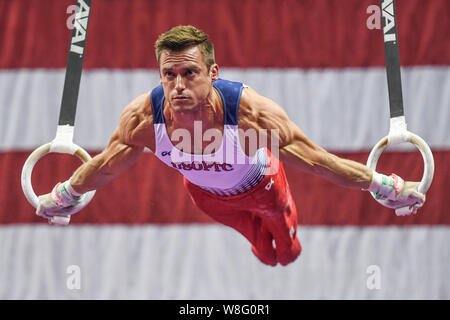 Kansas City, Missouri, Stati Uniti d'America. 8 Ago, 2019. SAM MIKULAK compete sul anelli ancora durante la prima giornata di gara svoltasi presso il Centro Sprint, Kansas City, Missouri. Credito: Amy Sanderson/ZUMA filo/Alamy Live News Foto Stock