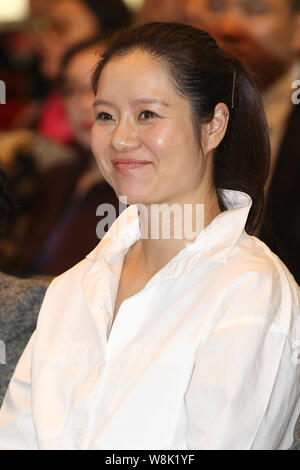 Cinese ritirato la stella del tennis Li Na sorrisi durante un evento di beneficenza per le donne in stato di gravidanza a Pechino in Cina, 26 marzo 2015. Foto Stock