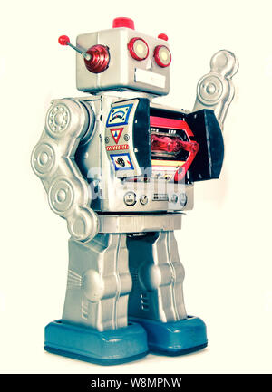 Argento retrò robot è sventolata isolato su bianco Foto Stock
