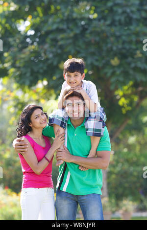 Family playing in a garden Stock Photo