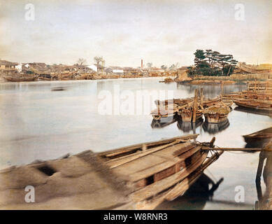 [ 1890 Giappone - barche sul fiume in Osaka ] - imbarcazioni e case a Enokoshima (江之子島), Osaka. Xix secolo albume vintage fotografia. Foto Stock