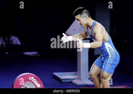 Taiyuan, Cina. 11 Ago, 2019. Fan Yang della provincia di Guizhou delegazione celebra durante uomini pesi 61kg Finale del 2° Giochi della Gioventù della Repubblica popolare di Cina a Taiyuan, del nord della Cina nella provincia dello Shanxi su 11 Agosto, 2019. Credito: Ou Dongqu/Xinhua/Alamy Live News Foto Stock