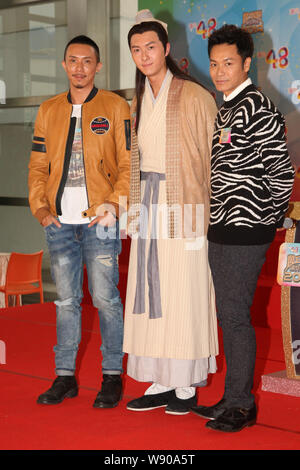 (Da sinistra) Hong Kong attori Louis Cheung, Vincent Wong e Roger Kwok Chun-su pongono in occasione di una conferenza stampa per il 2014 TVB Anniversario Awards di Hong Foto Stock