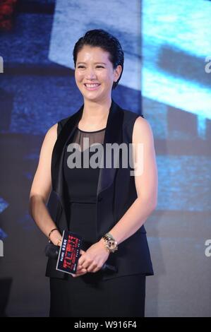 Hong Kong attrice Anita Yuen risate durante una conferenza stampa per il suo nuovo film, il Partito Deathday, a Pechino, in Cina, il 25 agosto 2014. Foto Stock